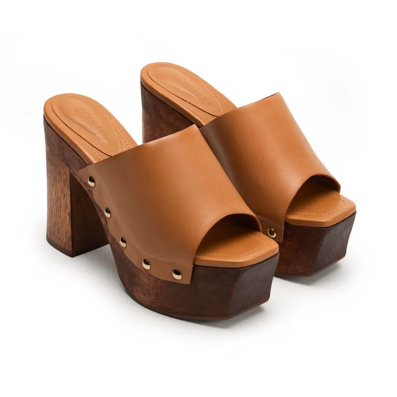 Pair of tan leather platform clog mules